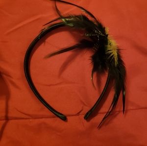 2 gorgeous hair bands with feather details. One black, and one turquoise